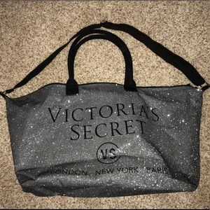 large silver sparkly Victoria’s Secret bag